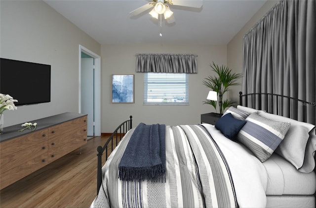 bedroom featuring hardwood / wood-style floors and ceiling fan