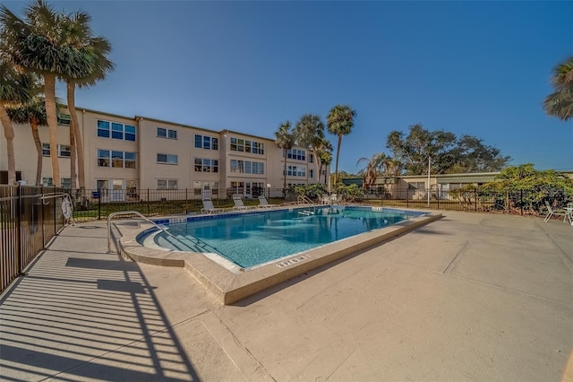 view of swimming pool featuring a patio