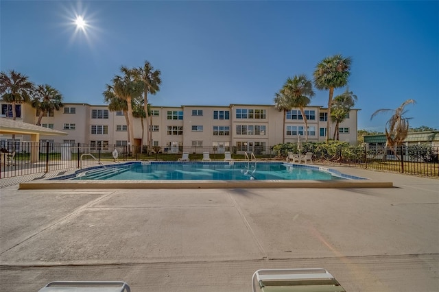 view of swimming pool featuring a patio area