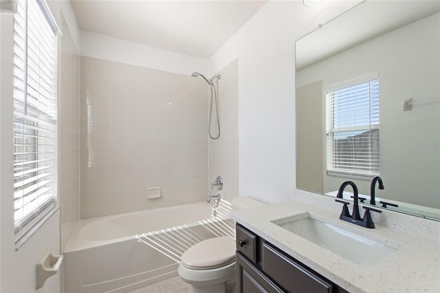 full bathroom featuring bathing tub / shower combination, tile patterned flooring, vanity, and toilet