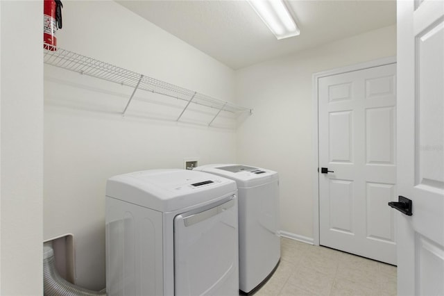 laundry area featuring separate washer and dryer