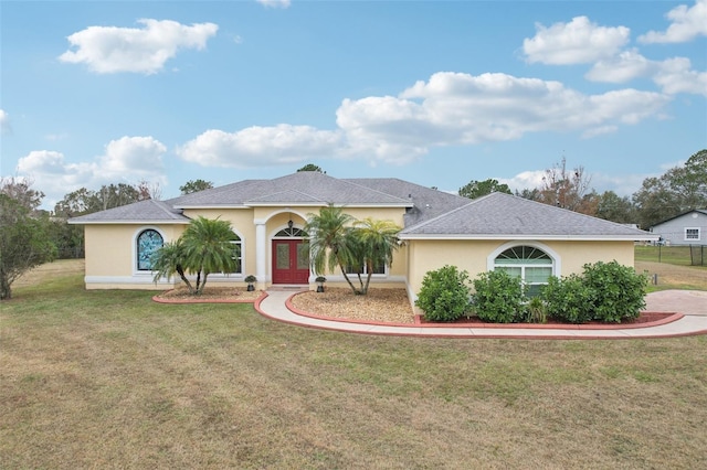 view of front of home with a front yard