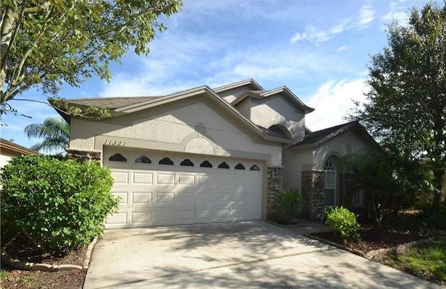 view of front of property featuring a garage