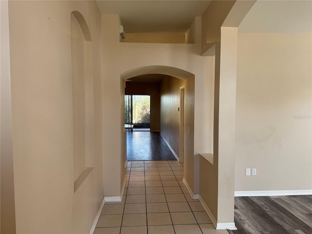 corridor with tile patterned flooring