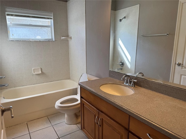 full bathroom with vanity, toilet, tiled shower / bath combo, and tile patterned flooring