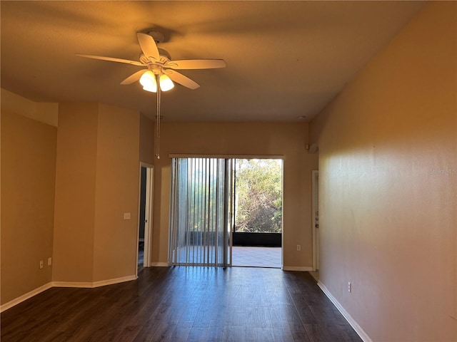 unfurnished room featuring ceiling fan and dark hardwood / wood-style floors