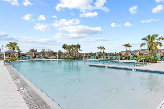 view of pool featuring a patio