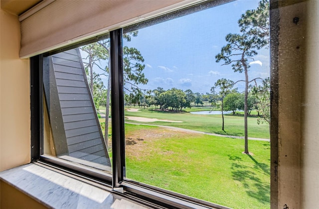 entryway with a water view and a healthy amount of sunlight