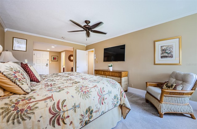 bedroom featuring carpet flooring, ceiling fan, and crown molding