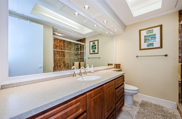 bathroom with tile patterned floors, vanity, toilet, and a shower with door