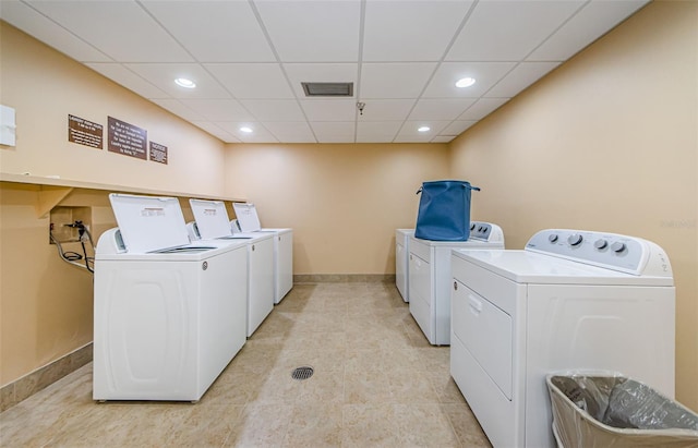 laundry room featuring washer and clothes dryer