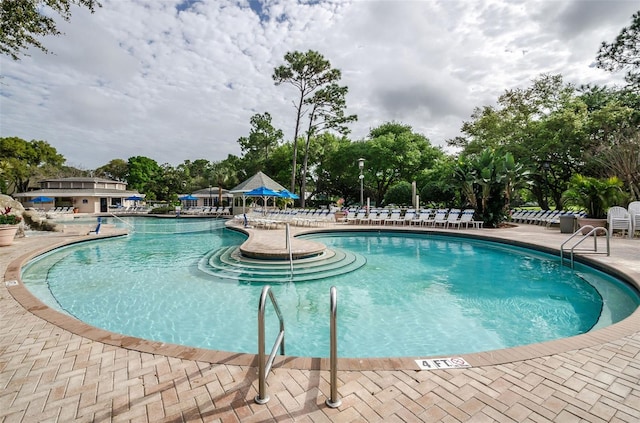 view of swimming pool featuring a patio