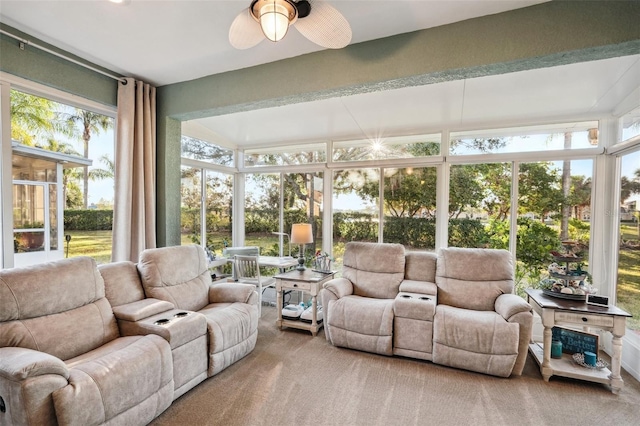 sunroom / solarium featuring ceiling fan