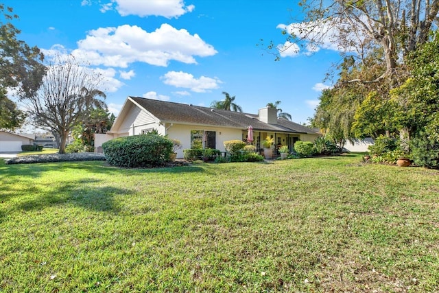 exterior space with a front yard