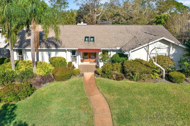 view of front facade featuring a front yard