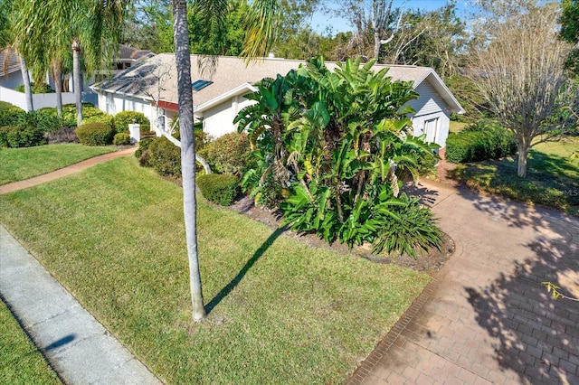 exterior space with a front lawn