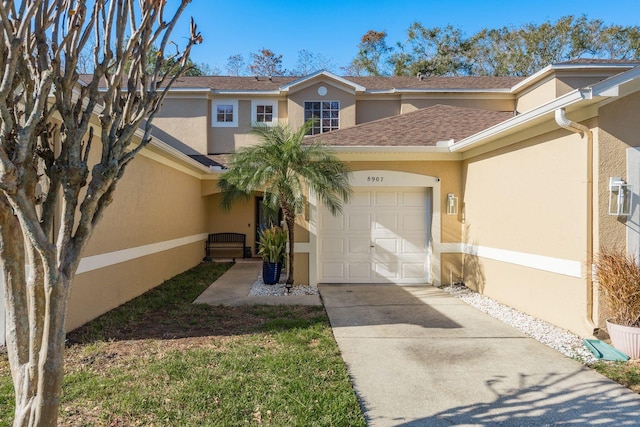 view of front of home with a garage