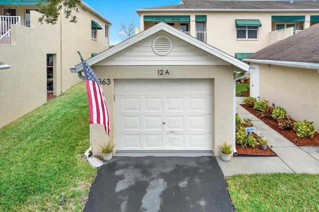 garage with a yard