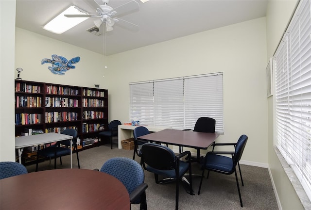 home office featuring carpet floors and ceiling fan