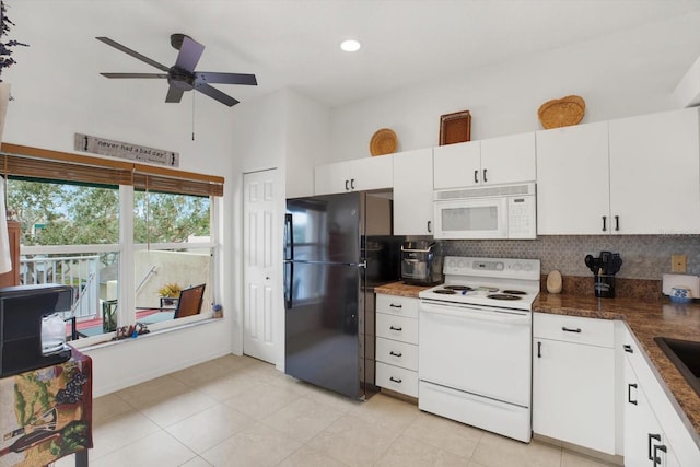 kitchen featuring white appliances, ceiling fan, decorative backsplash, and white cabinetry