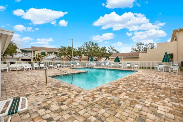 view of swimming pool featuring a patio