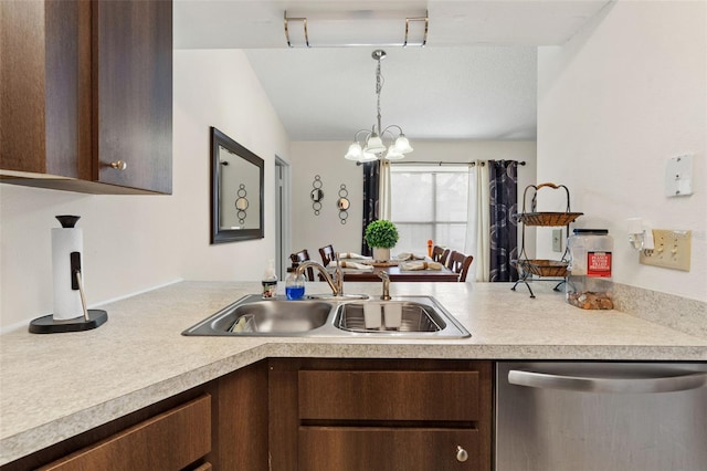 kitchen with hanging light fixtures, dark brown cabinetry, sink, an inviting chandelier, and stainless steel dishwasher