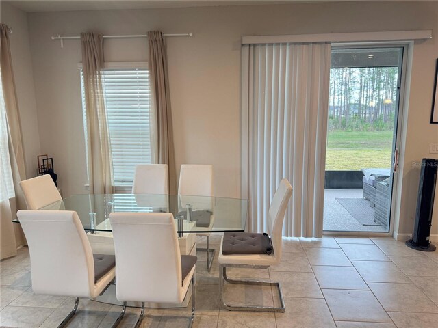 dining space with light tile patterned flooring