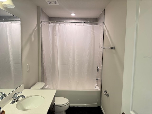 full bathroom featuring vanity, toilet, and shower / bath combo