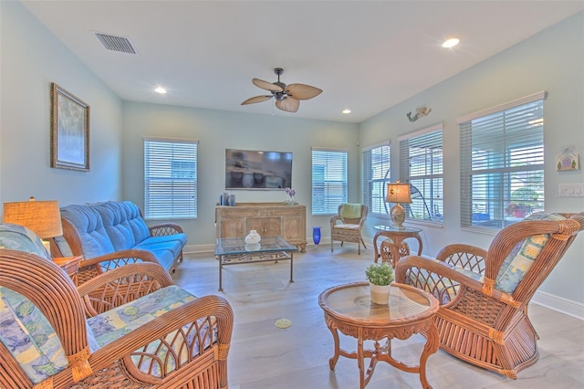 living room with ceiling fan