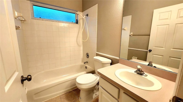 full bathroom featuring tile patterned flooring, vanity,  shower combination, and toilet