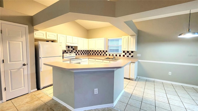 kitchen with decorative backsplash, white appliances, sink, pendant lighting, and a kitchen island