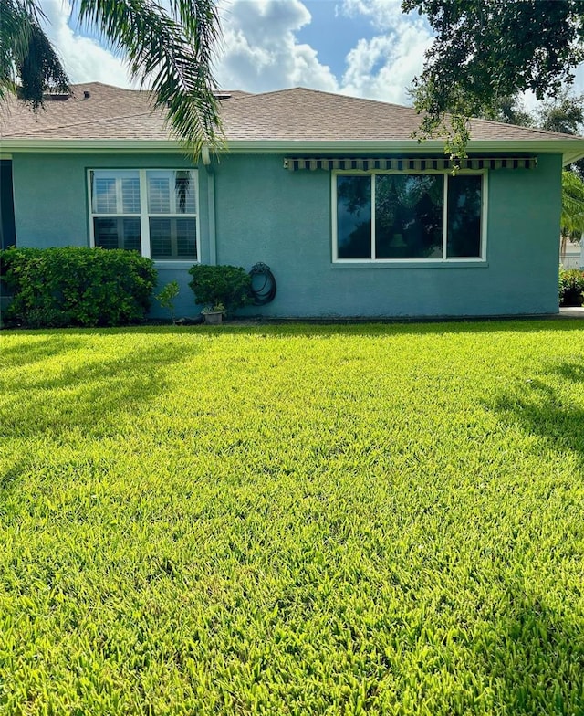 exterior space featuring a lawn