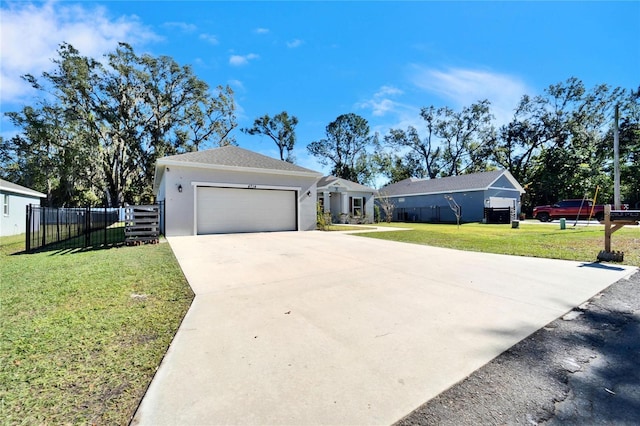 single story home featuring a front yard and a garage