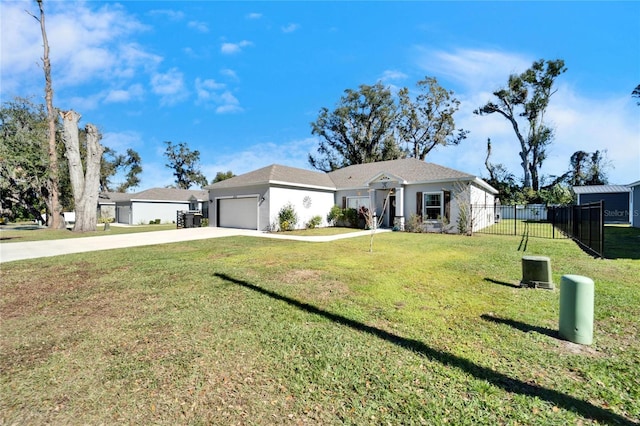 ranch-style house featuring a front lawn and a garage