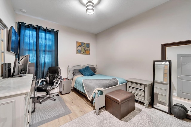 bedroom featuring light wood-type flooring