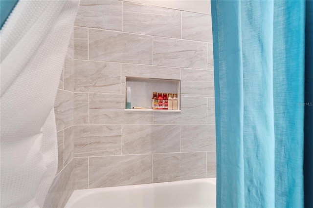 bathroom featuring shower / bath combination with curtain