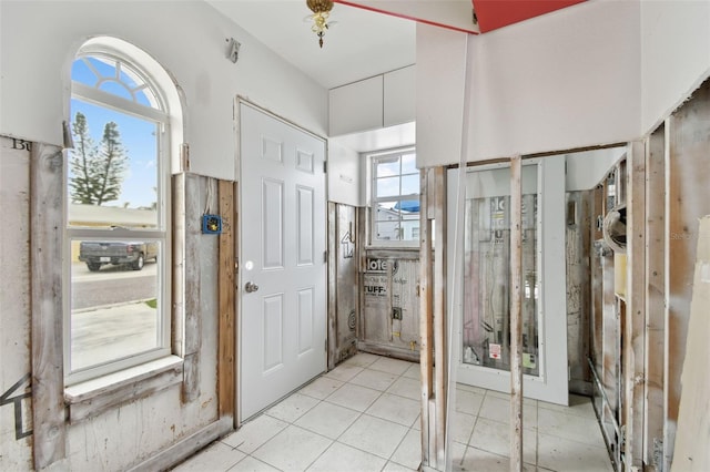 entrance foyer featuring light tile patterned floors