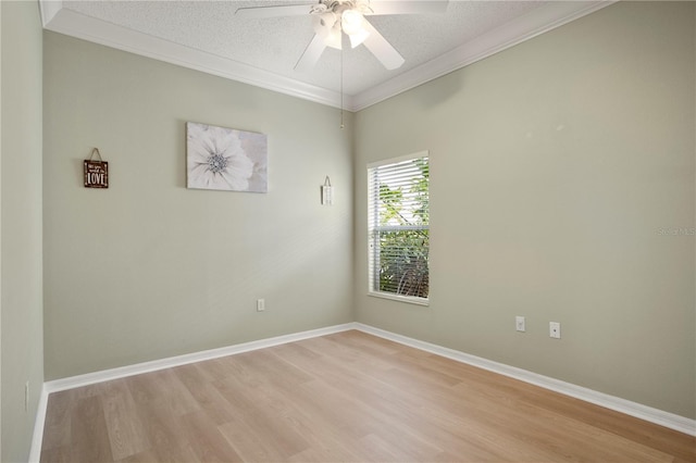 unfurnished room featuring ceiling fan, a textured ceiling, light hardwood / wood-style flooring, and ornamental molding