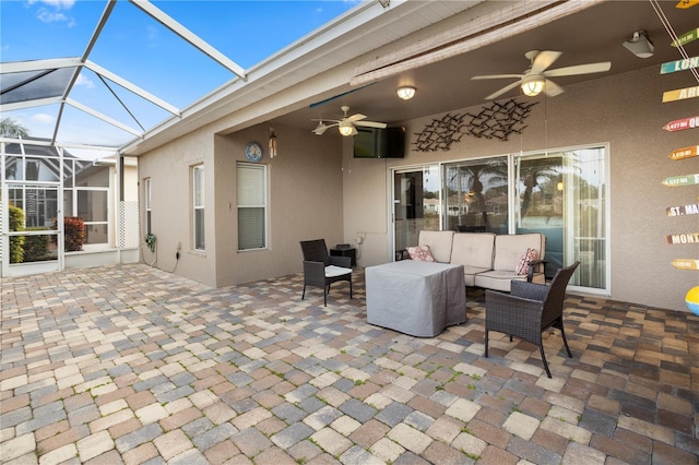 view of patio with ceiling fan and an outdoor hangout area