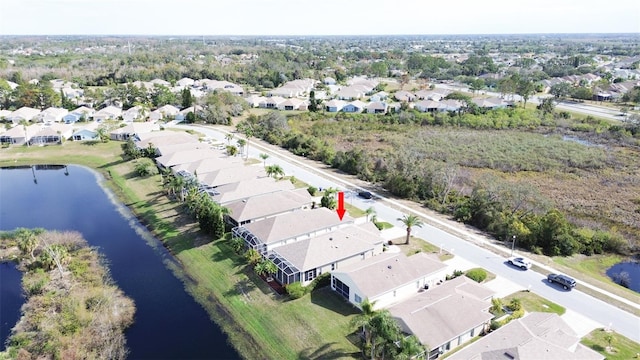 drone / aerial view featuring a water view