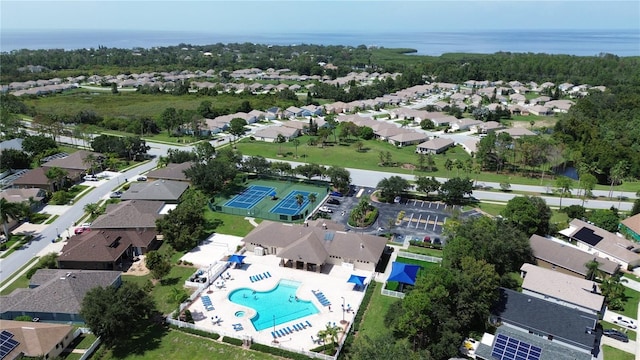 drone / aerial view with a water view