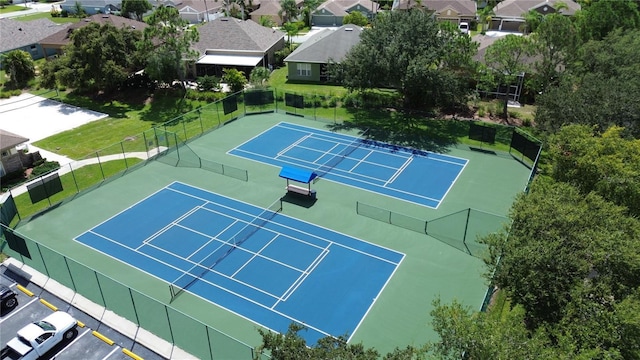 view of sport court featuring basketball hoop