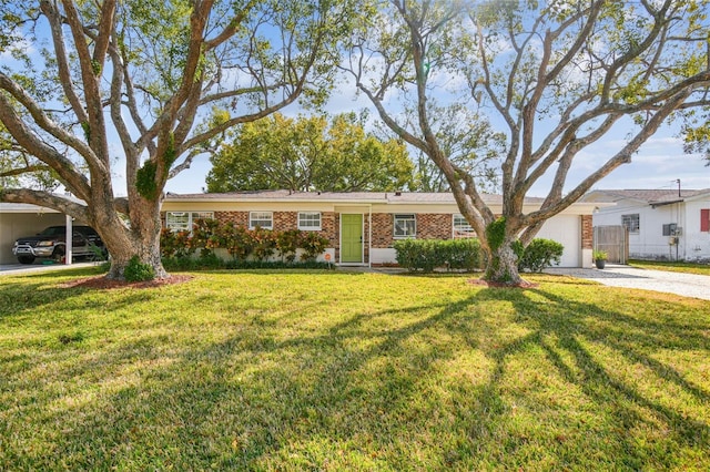 ranch-style home featuring a front yard