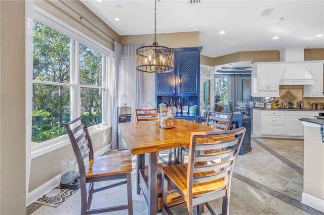 dining room with a chandelier