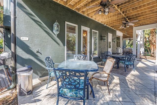 view of patio / terrace featuring ceiling fan