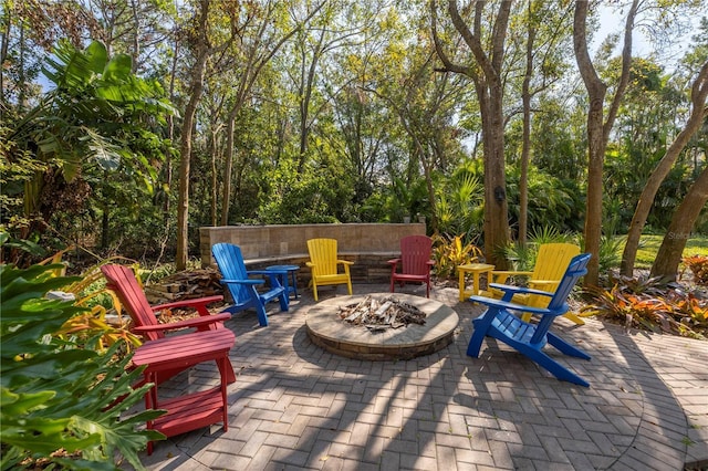 view of patio featuring a fire pit