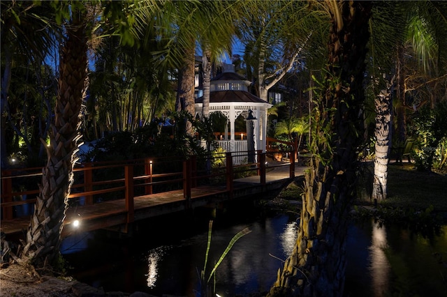 dock area featuring a water view and a gazebo