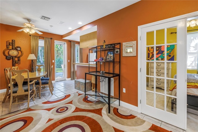 dining area featuring light tile patterned floors, baseboards, visible vents, and recessed lighting