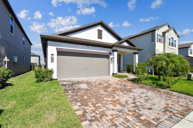 view of front of property with a garage, cooling unit, and a front lawn