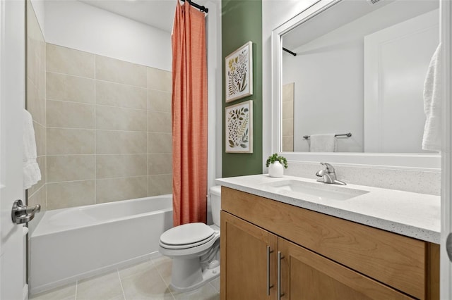 full bathroom featuring toilet, tile patterned floors, vanity, and shower / bath combo